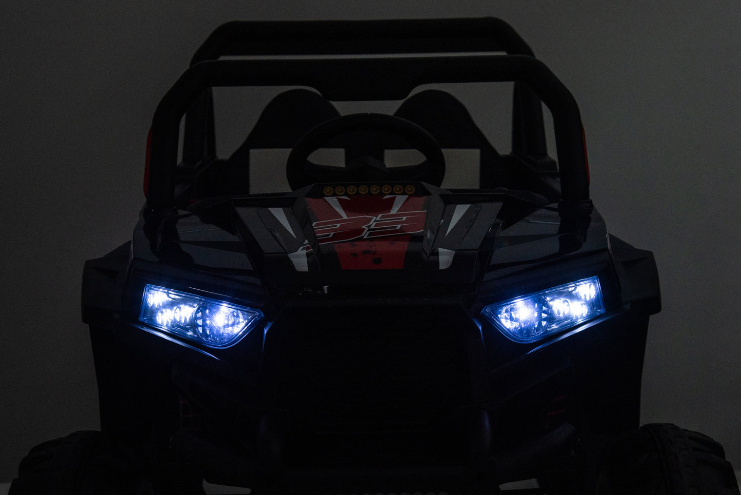 12V 7A*1 30W*4 Four-Wheel Drive Leather Seat RC Car: One Button Start, Forward/Backward, High/Low Speed, Music, Front Light, Power Display, Opening Doors, Seat Belt, 2.4G R/C, Four-Wheel Absorber - Black