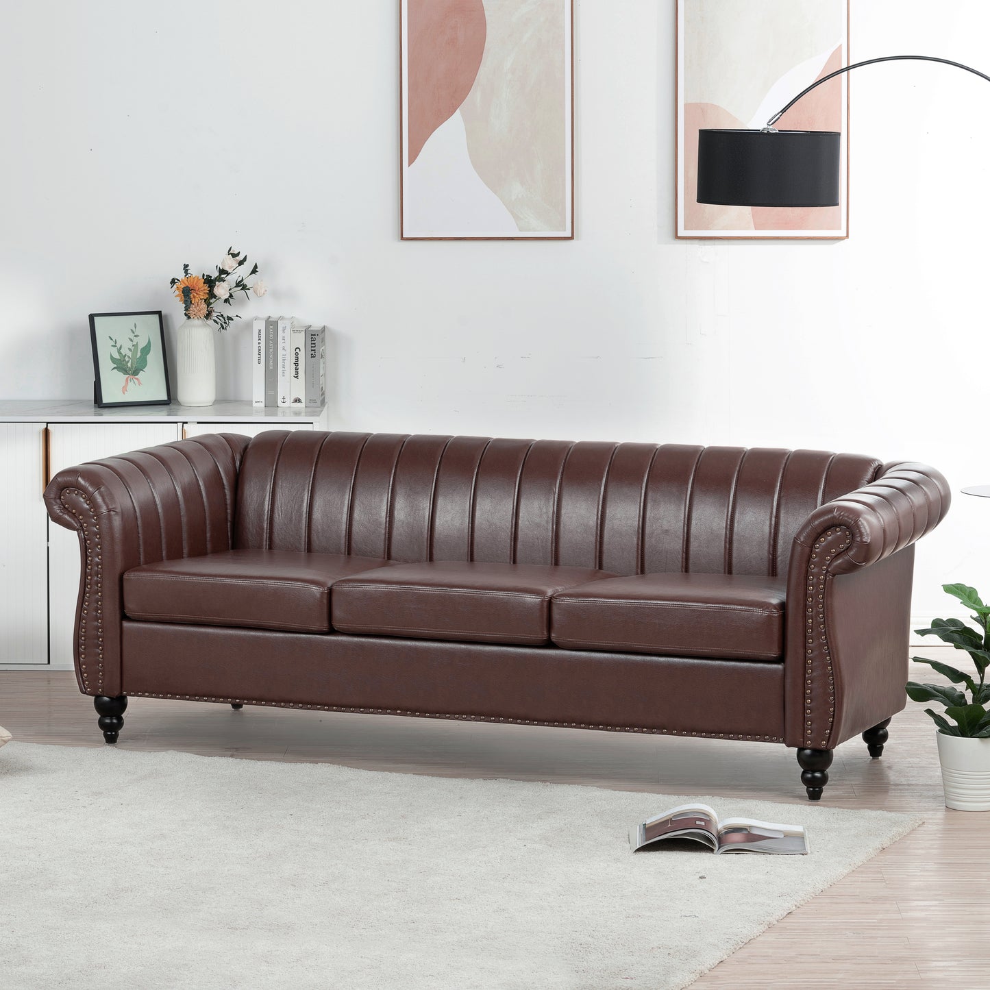 83.46'' Brown PU Rolled Arm Chesterfield Three Seater Sofa: Elegant and Spacious Upholstered Seating Solution with Classic Rolled Arms and Luxurious Brown PU Leather Finish