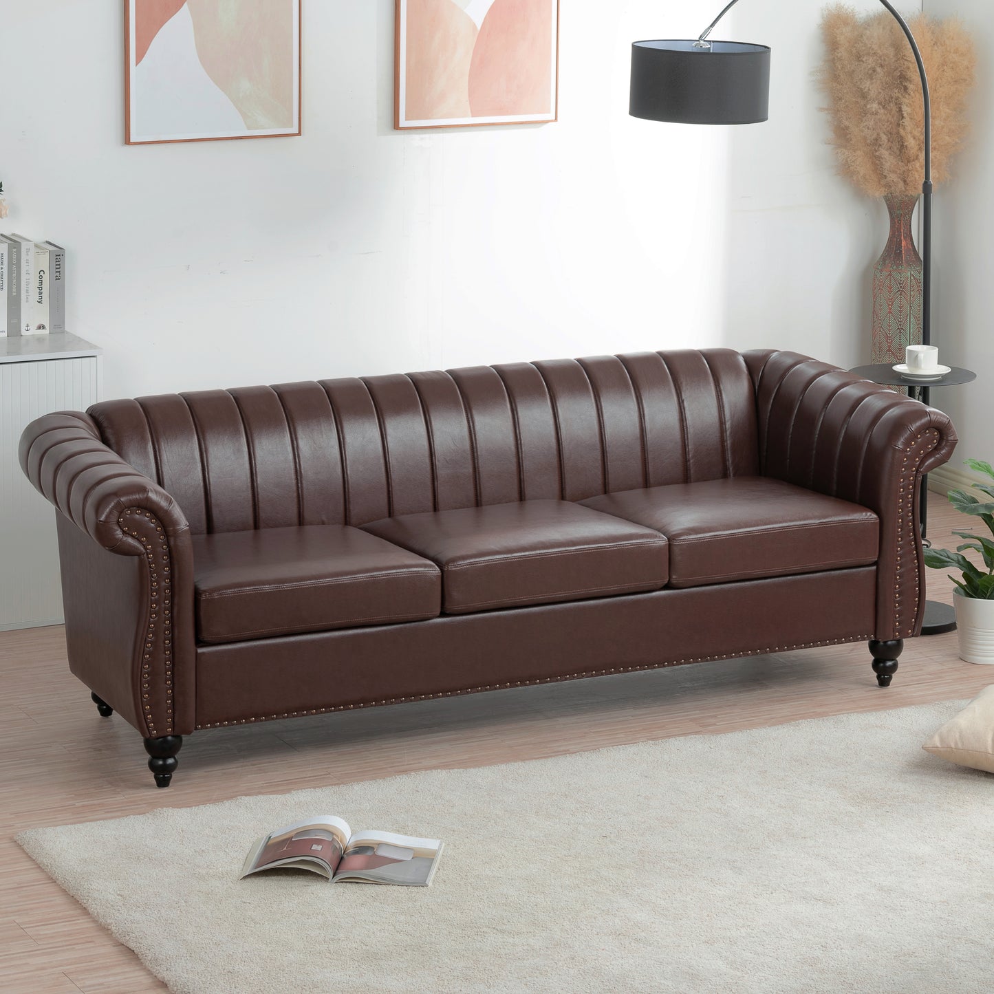 83.46'' Brown PU Rolled Arm Chesterfield Three Seater Sofa: Elegant and Spacious Upholstered Seating Solution with Classic Rolled Arms and Luxurious Brown PU Leather Finish