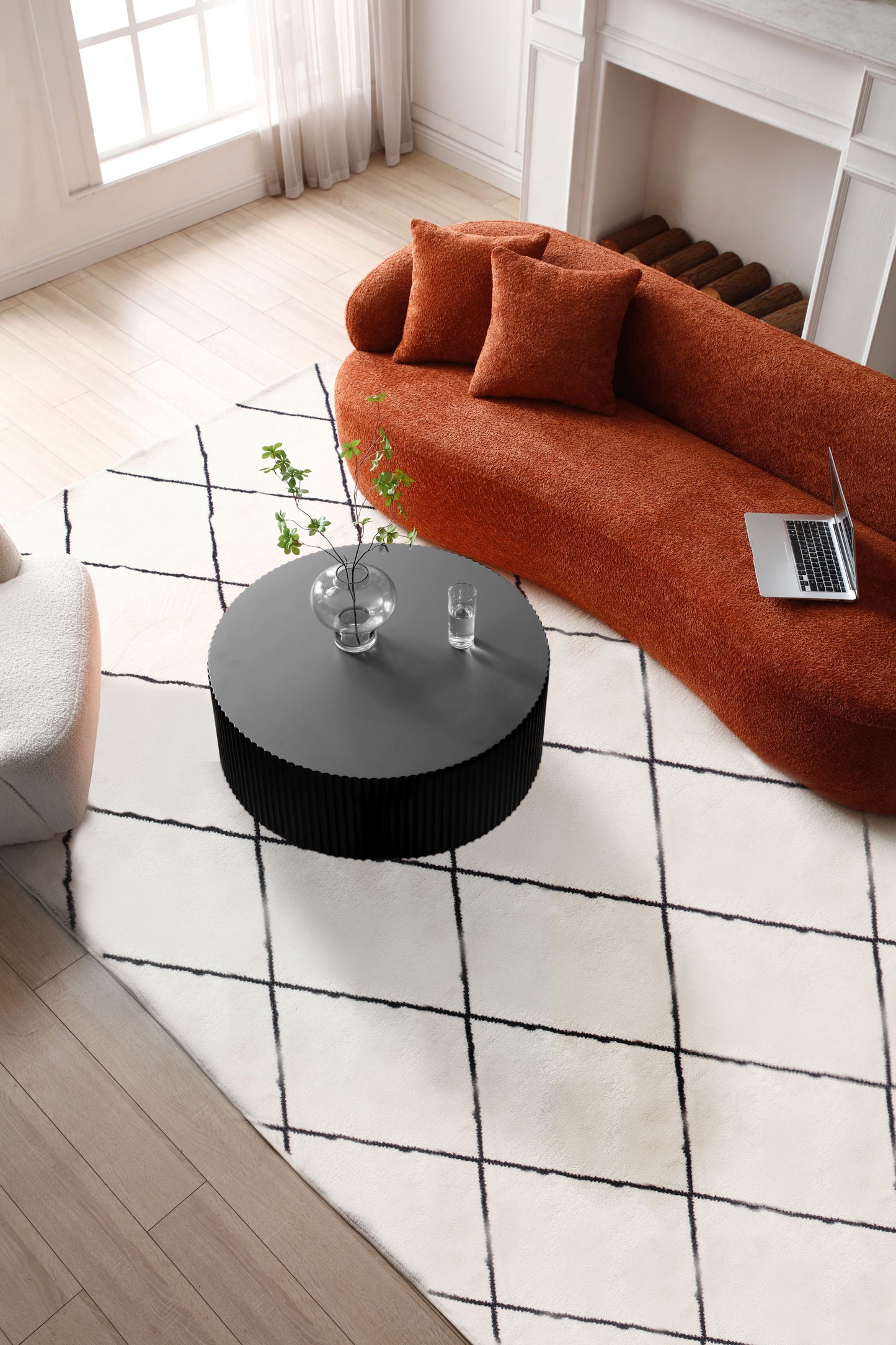 Sleek and Modern Round Coffee Table with Eye-Catching Relief Design, Black - Stylish and Contemporary Furniture Piece with Captivating Details