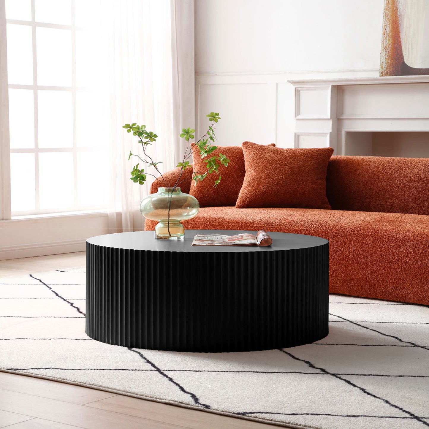 Sleek and Modern Round Coffee Table with Eye-Catching Relief Design, Black - Stylish and Contemporary Furniture Piece with Captivating Details